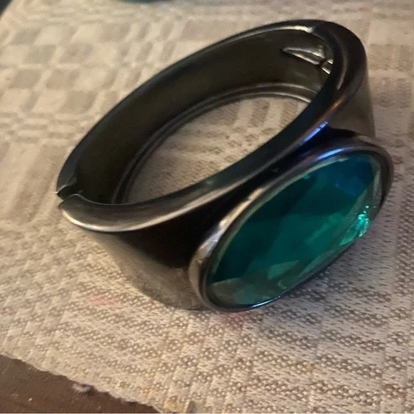 Relativity hinged cuff bracelets with large green stones. - Picture 3 of 3